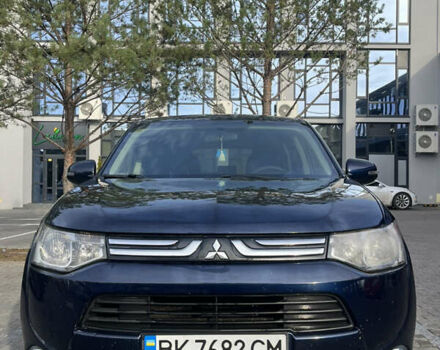 Синий Мицубиси Аутлендер, объемом двигателя 2.36 л и пробегом 187 тыс. км за 9999 $, фото 1 на Automoto.ua