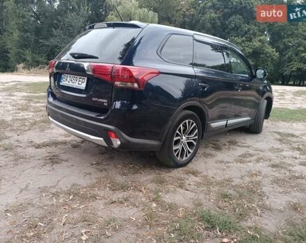 Синий Мицубиси Аутлендер, объемом двигателя 2.36 л и пробегом 135 тыс. км за 15600 $, фото 5 на Automoto.ua