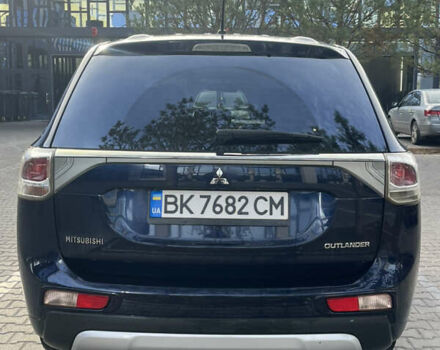 Синий Мицубиси Аутлендер, объемом двигателя 2.36 л и пробегом 187 тыс. км за 9999 $, фото 5 на Automoto.ua