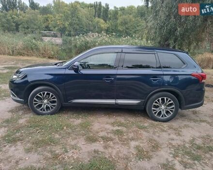 Синий Мицубиси Аутлендер, объемом двигателя 2.36 л и пробегом 135 тыс. км за 15600 $, фото 7 на Automoto.ua