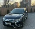 Синий Мицубиси Аутлендер, объемом двигателя 2.38 л и пробегом 99 тыс. км за 15400 $, фото 1 на Automoto.ua