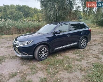 Синий Мицубиси Аутлендер, объемом двигателя 2.36 л и пробегом 135 тыс. км за 15600 $, фото 15 на Automoto.ua