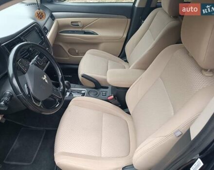 Синий Мицубиси Аутлендер, объемом двигателя 2.36 л и пробегом 135 тыс. км за 15600 $, фото 4 на Automoto.ua