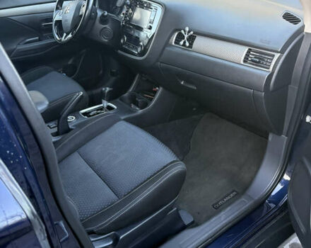 Синий Мицубиси Аутлендер, объемом двигателя 2.38 л и пробегом 99 тыс. км за 15400 $, фото 10 на Automoto.ua