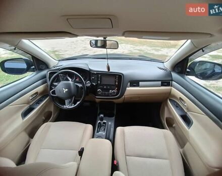 Синий Мицубиси Аутлендер, объемом двигателя 2.36 л и пробегом 135 тыс. км за 15600 $, фото 9 на Automoto.ua