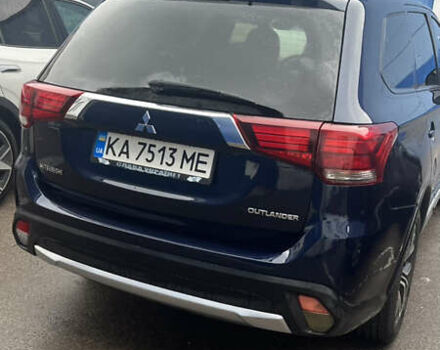 Синий Мицубиси Аутлендер, объемом двигателя 2.36 л и пробегом 203 тыс. км за 14200 $, фото 2 на Automoto.ua