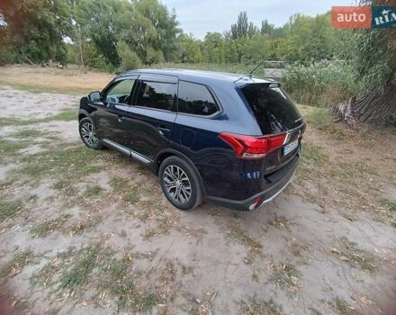 Синий Мицубиси Аутлендер, объемом двигателя 2.36 л и пробегом 135 тыс. км за 15600 $, фото 6 на Automoto.ua