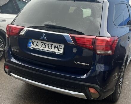 Синий Мицубиси Аутлендер, объемом двигателя 2.4 л и пробегом 202 тыс. км за 14300 $, фото 1 на Automoto.ua