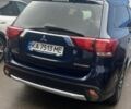 Синий Мицубиси Аутлендер, объемом двигателя 2.4 л и пробегом 202 тыс. км за 14300 $, фото 1 на Automoto.ua