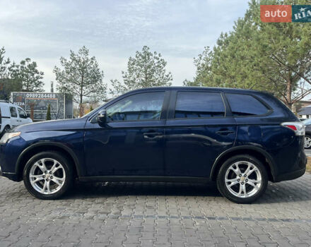 Синий Мицубиси Аутлендер, объемом двигателя 2.36 л и пробегом 187 тыс. км за 9999 $, фото 3 на Automoto.ua