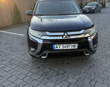 Синий Мицубиси Аутлендер, объемом двигателя 2.38 л и пробегом 99 тыс. км за 15400 $, фото 8 на Automoto.ua
