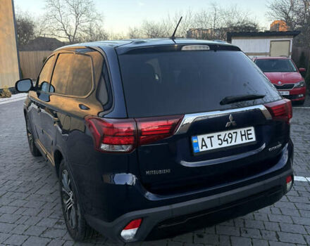 Синий Мицубиси Аутлендер, объемом двигателя 2.38 л и пробегом 99 тыс. км за 15400 $, фото 4 на Automoto.ua
