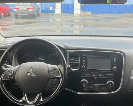 Синий Мицубиси Аутлендер, объемом двигателя 2.36 л и пробегом 203 тыс. км за 14200 $, фото 6 на Automoto.ua