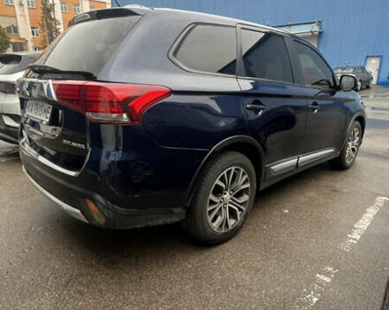 Синий Мицубиси Аутлендер, объемом двигателя 2.36 л и пробегом 203 тыс. км за 14200 $, фото 3 на Automoto.ua