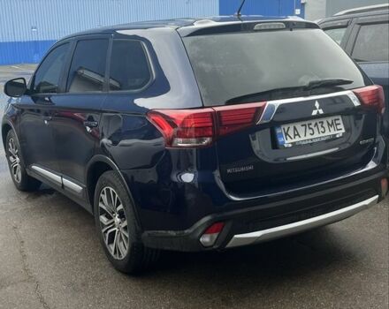 Синий Мицубиси Аутлендер, объемом двигателя 2.4 л и пробегом 202 тыс. км за 14300 $, фото 2 на Automoto.ua