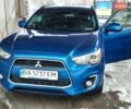 Синий Мицубиси Аутлендер, объемом двигателя 2.36 л и пробегом 151 тыс. км за 12500 $, фото 1 на Automoto.ua