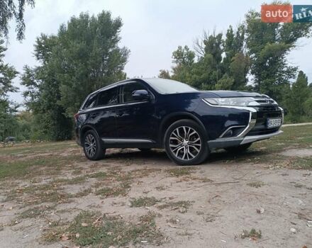 Синий Мицубиси Аутлендер, объемом двигателя 2.36 л и пробегом 135 тыс. км за 15600 $, фото 13 на Automoto.ua