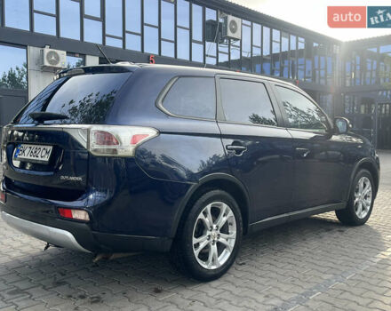 Синий Мицубиси Аутлендер, объемом двигателя 2.36 л и пробегом 187 тыс. км за 9999 $, фото 6 на Automoto.ua