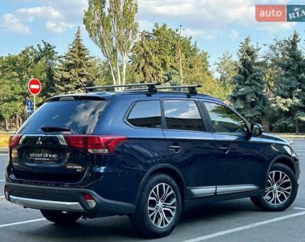 Синий Мицубиси Аутлендер, объемом двигателя 2.36 л и пробегом 170 тыс. км за 12999 $, фото 5 на Automoto.ua