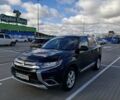 Синій Міцубісі Аутлендер, об'ємом двигуна 2.36 л та пробігом 161 тис. км за 14400 $, фото 2 на Automoto.ua
