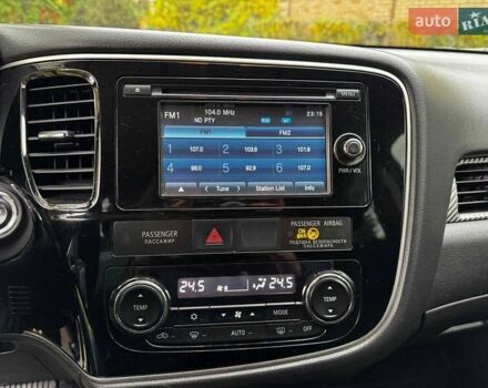 Синий Мицубиси Аутлендер, объемом двигателя 2 л и пробегом 238 тыс. км за 14940 $, фото 16 на Automoto.ua