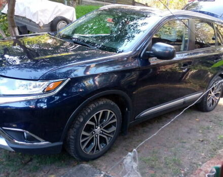 Синій Міцубісі Аутлендер, об'ємом двигуна 2.36 л та пробігом 162 тис. км за 15700 $, фото 6 на Automoto.ua