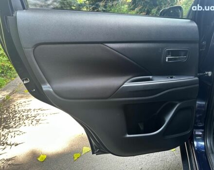 Синій Міцубісі Аутлендер, об'ємом двигуна 2 л та пробігом 238 тис. км за 15990 $, фото 17 на Automoto.ua