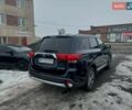Синий Мицубиси Аутлендер, объемом двигателя 2.36 л и пробегом 195 тыс. км за 13450 $, фото 5 на Automoto.ua