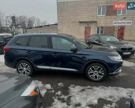 Синий Мицубиси Аутлендер, объемом двигателя 2.36 л и пробегом 195 тыс. км за 13450 $, фото 3 на Automoto.ua