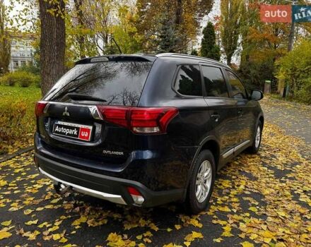 Синий Мицубиси Аутлендер, объемом двигателя 2 л и пробегом 238 тыс. км за 14940 $, фото 5 на Automoto.ua