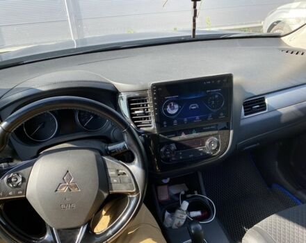 Синій Міцубісі Аутлендер, об'ємом двигуна 2.4 л та пробігом 68 тис. км за 15000 $, фото 5 на Automoto.ua