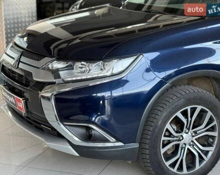 Синий Мицубиси Аутлендер, объемом двигателя 3 л и пробегом 144 тыс. км за 15940 $, фото 3 на Automoto.ua