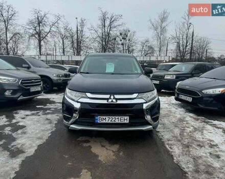 Синий Мицубиси Аутлендер, объемом двигателя 2.36 л и пробегом 195 тыс. км за 13450 $, фото 1 на Automoto.ua