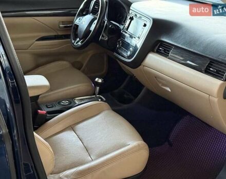 Синий Мицубиси Аутлендер, объемом двигателя 3 л и пробегом 144 тыс. км за 15940 $, фото 19 на Automoto.ua