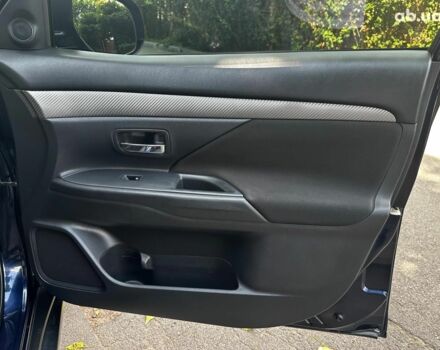 Синій Міцубісі Аутлендер, об'ємом двигуна 2 л та пробігом 238 тис. км за 15990 $, фото 23 на Automoto.ua