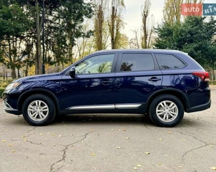 Синий Мицубиси Аутлендер, объемом двигателя 3 л и пробегом 123 тыс. км за 15900 $, фото 3 на Automoto.ua