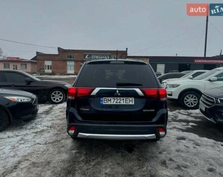 Синий Мицубиси Аутлендер, объемом двигателя 2.36 л и пробегом 195 тыс. км за 13450 $, фото 4 на Automoto.ua