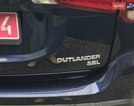 Синий Мицубиси Аутлендер, объемом двигателя 2.4 л и пробегом 134 тыс. км за 13999 $, фото 29 на Automoto.ua