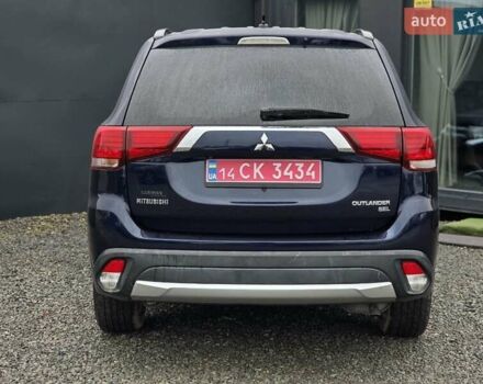 Синий Мицубиси Аутлендер, объемом двигателя 2.4 л и пробегом 134 тыс. км за 13999 $, фото 18 на Automoto.ua