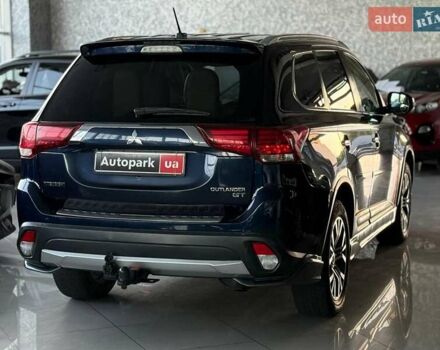 Синий Мицубиси Аутлендер, объемом двигателя 3 л и пробегом 144 тыс. км за 15940 $, фото 7 на Automoto.ua