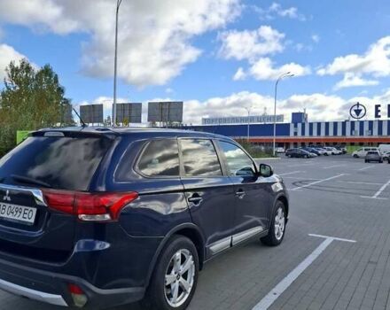 Синій Міцубісі Аутлендер, об'ємом двигуна 2.36 л та пробігом 161 тис. км за 14400 $, фото 3 на Automoto.ua