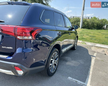 Синий Мицубиси Аутлендер, объемом двигателя 3 л и пробегом 157 тыс. км за 15000 $, фото 7 на Automoto.ua