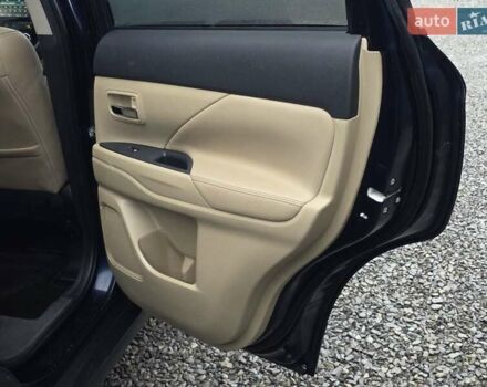 Синий Мицубиси Аутлендер, объемом двигателя 2.4 л и пробегом 134 тыс. км за 13999 $, фото 27 на Automoto.ua