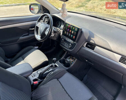 Синий Мицубиси Аутлендер, объемом двигателя 3 л и пробегом 157 тыс. км за 15000 $, фото 11 на Automoto.ua