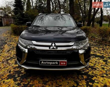 Синий Мицубиси Аутлендер, объемом двигателя 2 л и пробегом 238 тыс. км за 14940 $, фото 1 на Automoto.ua