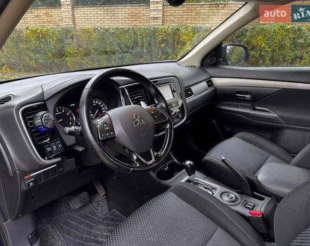 Синий Мицубиси Аутлендер, объемом двигателя 2 л и пробегом 238 тыс. км за 14940 $, фото 11 на Automoto.ua
