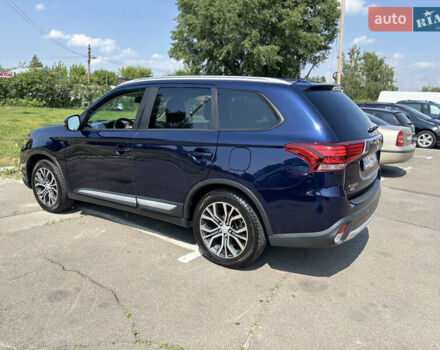 Синий Мицубиси Аутлендер, объемом двигателя 3 л и пробегом 157 тыс. км за 15000 $, фото 4 на Automoto.ua