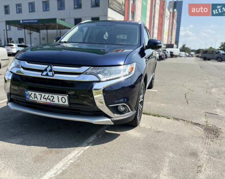 Синий Мицубиси Аутлендер, объемом двигателя 3 л и пробегом 157 тыс. км за 15000 $, фото 1 на Automoto.ua