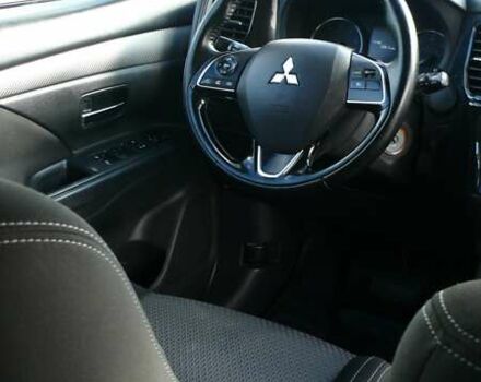 Синій Міцубісі Аутлендер, об'ємом двигуна 2.36 л та пробігом 161 тис. км за 14400 $, фото 11 на Automoto.ua