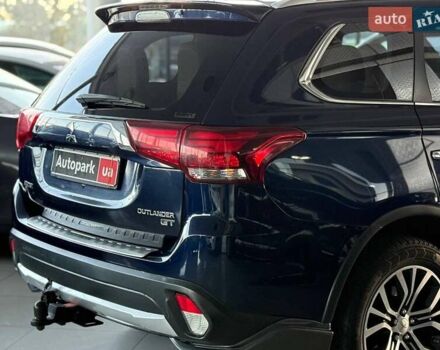 Синий Мицубиси Аутлендер, объемом двигателя 3 л и пробегом 144 тыс. км за 15940 $, фото 8 на Automoto.ua